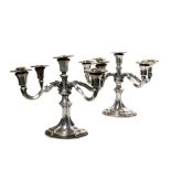 Pair of 800 silver candelabra '50, with five flames, circular base with shaped profile,
