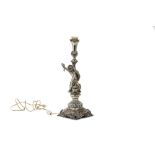 Silver lamp manifacture Italy, '50, cantilevered, putto-shaped stem and sea monster, circular base