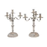 Pair of four-flame candelabra in 800 silver early 20th century, baluster drums on shaped base,