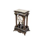 Small clock France, early 20th century, 36 x 21 x 13 cmin black granite and green granite, with four