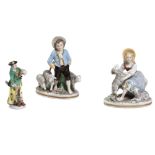 Lot of three sculptures in white and polychrome porcelain mid 20th century, depicting two shepherd
