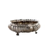 Centerpiece in 800 silver manifacture Italy, mid 20th century, pod body resting on four curly