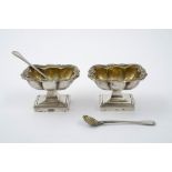 Pair of salt shakers with silver spoonsNapoli, mid 19th century, a four-lobed shape, with