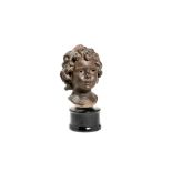 Saviero Sortini (1860 - 1925) Bust of child in lacquered terracotta, 37 x 19 cmwooden base, signed