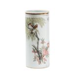 Cylinder vase in white porcelainCina, 20th century, decorated with flowery and volatile branches,