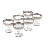 Lot of six crystal champagne glasses, silver bands decorated with scrolls