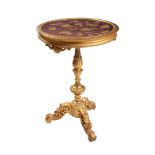 Carved and gilded wooden coffee table manifacture ligure, mid 19th century, with tripod base,