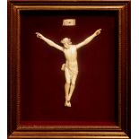 Christ in ivory France, mid 19th century, within gilded wooden notice board24 x 19 cm