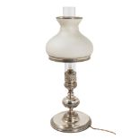 Silver table lamp Italy, '60, circular base with border decorated with plant motifs, baluster shaft,