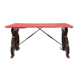 Renaissance style table manifacture toscana, early 20th century, carved ebonized wood, top covered