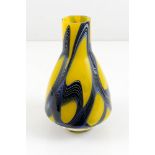 Yellow glass vase 20th century, with twisted band motifs in blue and whitecm 32