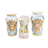 Lot of three majolica pharmacy albarelli manifacture toscana, '70-'80, with phytomorphic