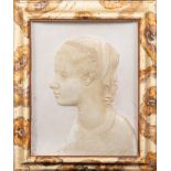 Plaster cast depicting a woman's profile Italy, periodo Liberty, in a frame painted in fake marble