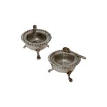 Pair of salt shakers in 800 silver Italy, '60, circular in shape, with three feral-legged feet,