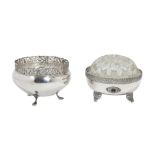 Lot of two 800 silver flower holders Italy, mid 20th century, smooth body, perforated edge, one of