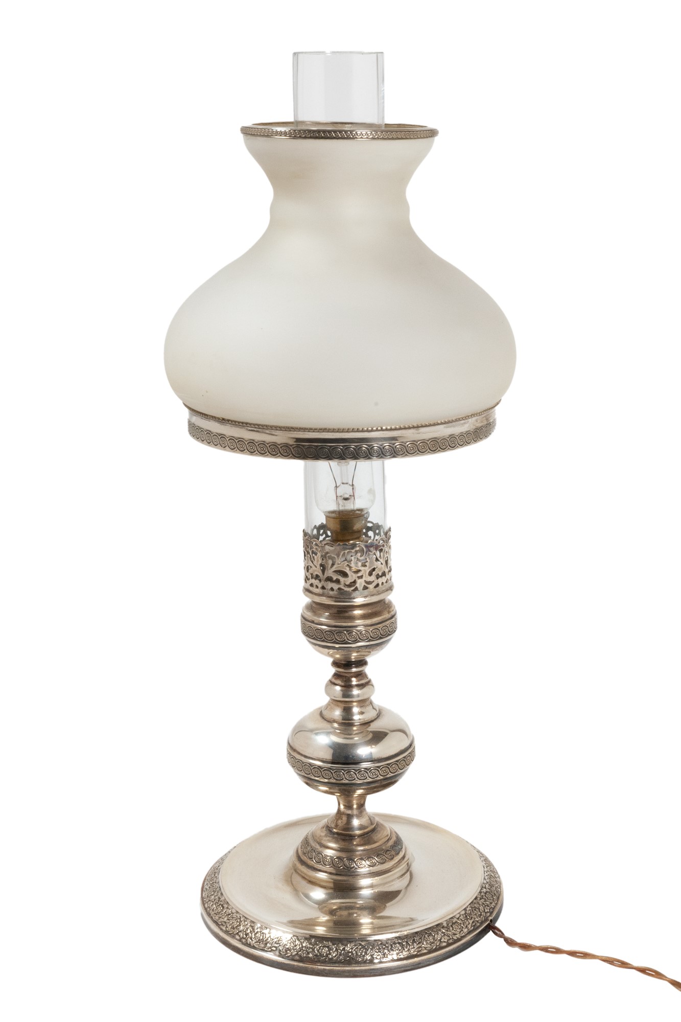 Silver table lampItaly, 1960scircular base with border decorated with plant motifs, baluster