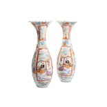 Pair of trumpet vases in porcelainJapan Kutani, late 19th centurywith polychrome decoration on a