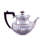 800 silver teapotItaly, 1940sembossed and chiseled by hand, piriform body with handle and knob in