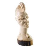 Ivory sculpture early 20th centuryof the face of an African native h cm 8