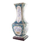 Porcelain vaseItaly, mid-20th centurywith blue and gold decoration on a white background, with