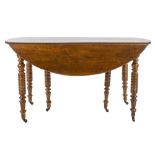 Striped tableEngland, early 20th centuryin walnut wood, round top, six turned legs, feet on castors,