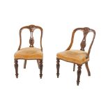 Pair of walnut chairsLigurian manufacture, mid 19th centuryshaped and carved back with perforated