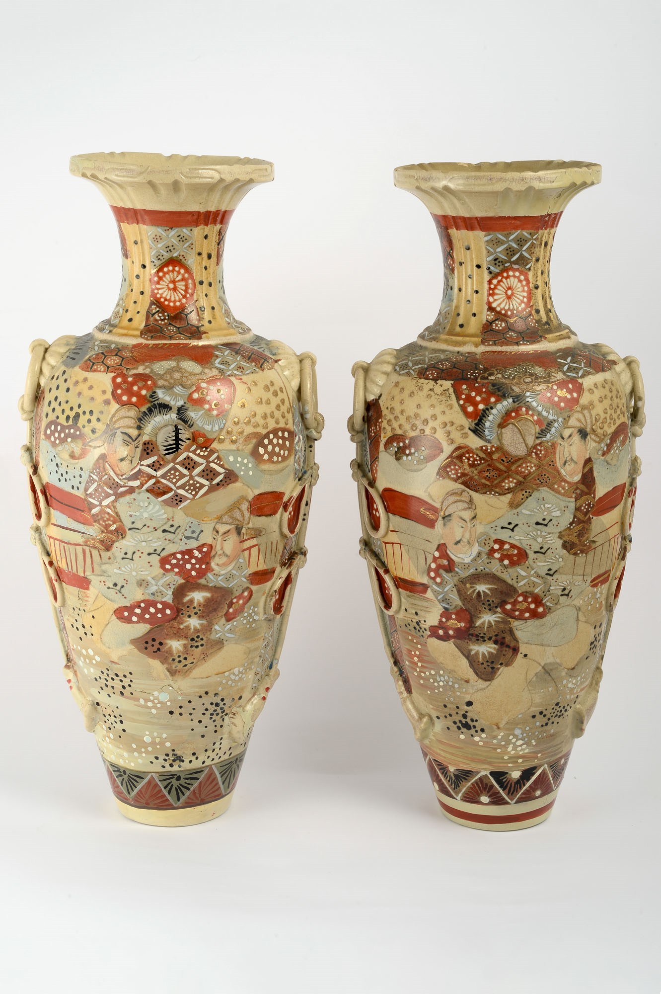 Pair of Satsuma vasesJapan, first half of the 20th centurydecorated with samurai, restorations and