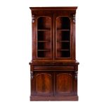 Bookcase in mahogany woodEngland, second half of the 19th centurybase with two paneled doors and one