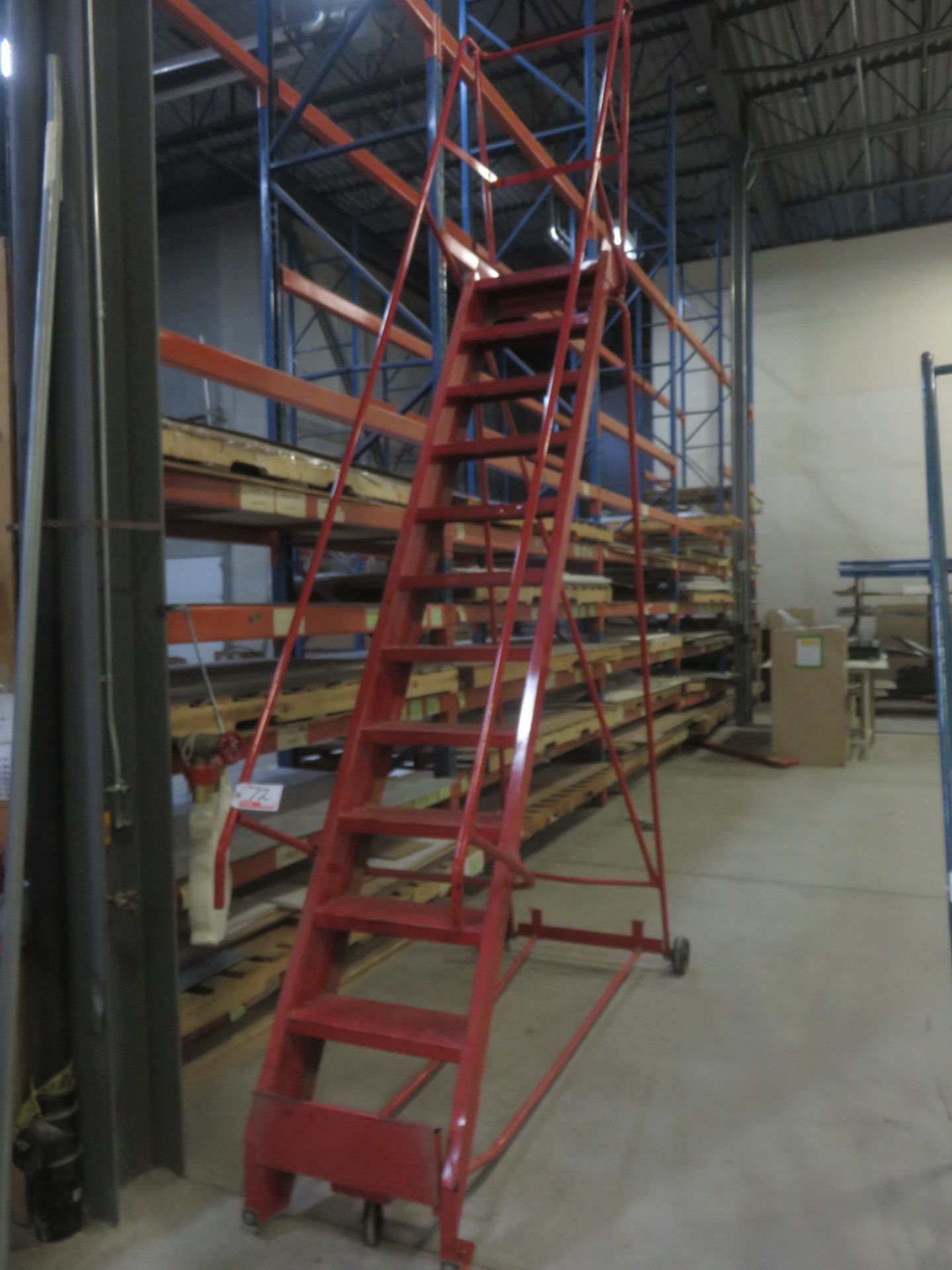 RED STEEL 12-STEP PORTABLE WAREHOUSE LADDER