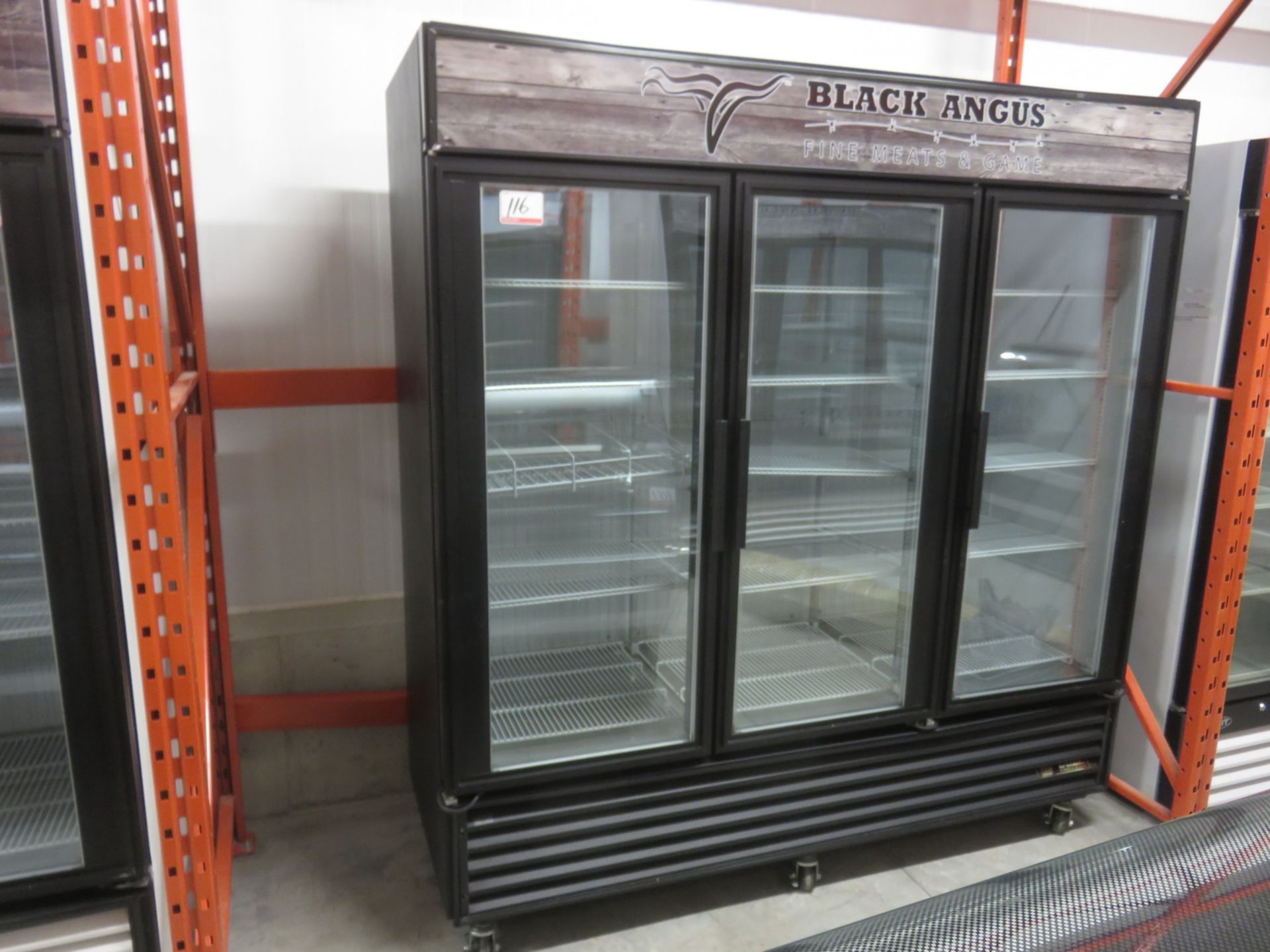 TRUE GDM-72 GLASS 3-DOOR MERCHANDISER FREEZER W/ CASTERS