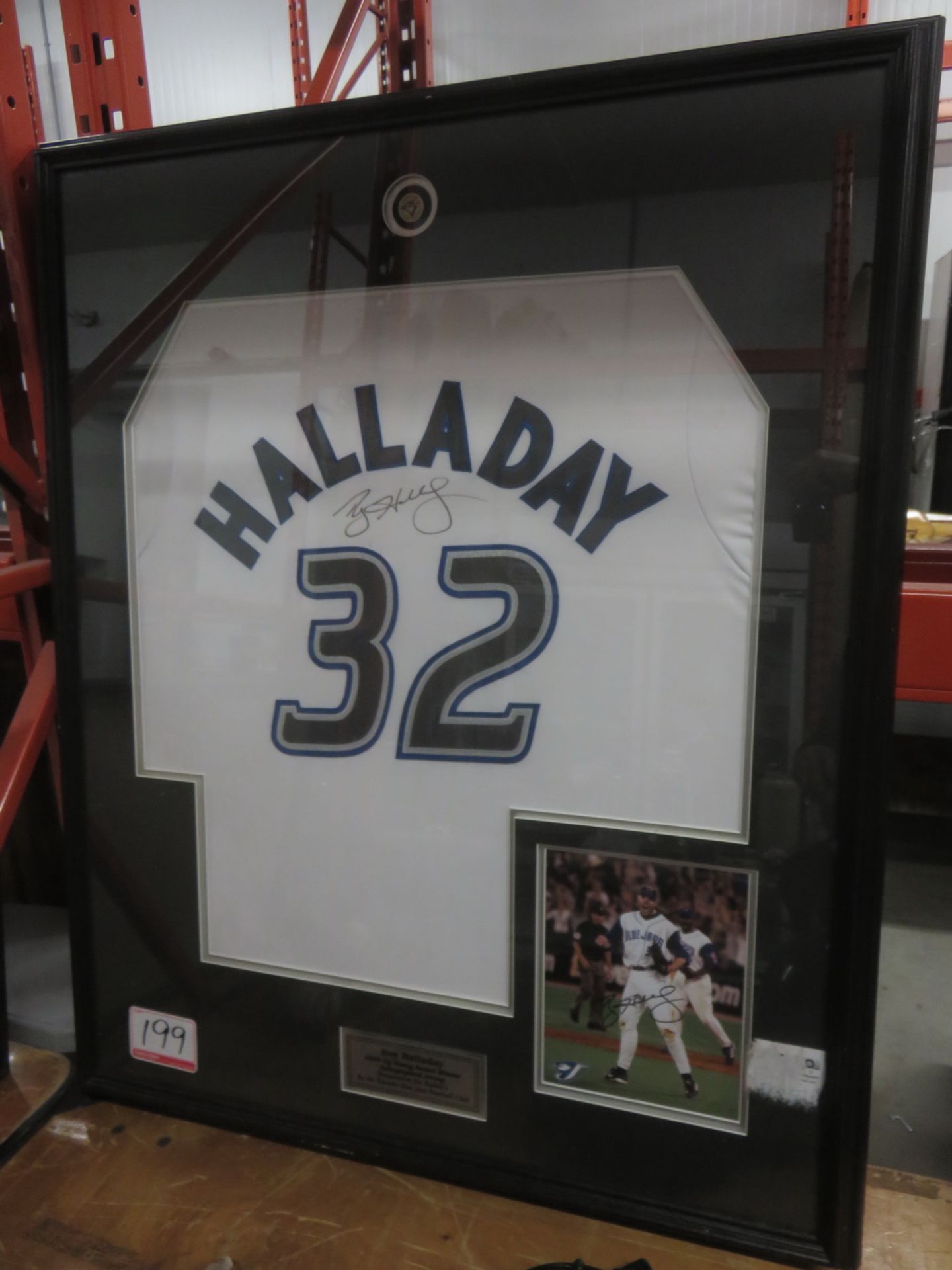 ROY HALLADAY 2003 CY YOUNG AWARD WINNER AUTOGRAPHED JERSEY & FRAMED SIGN