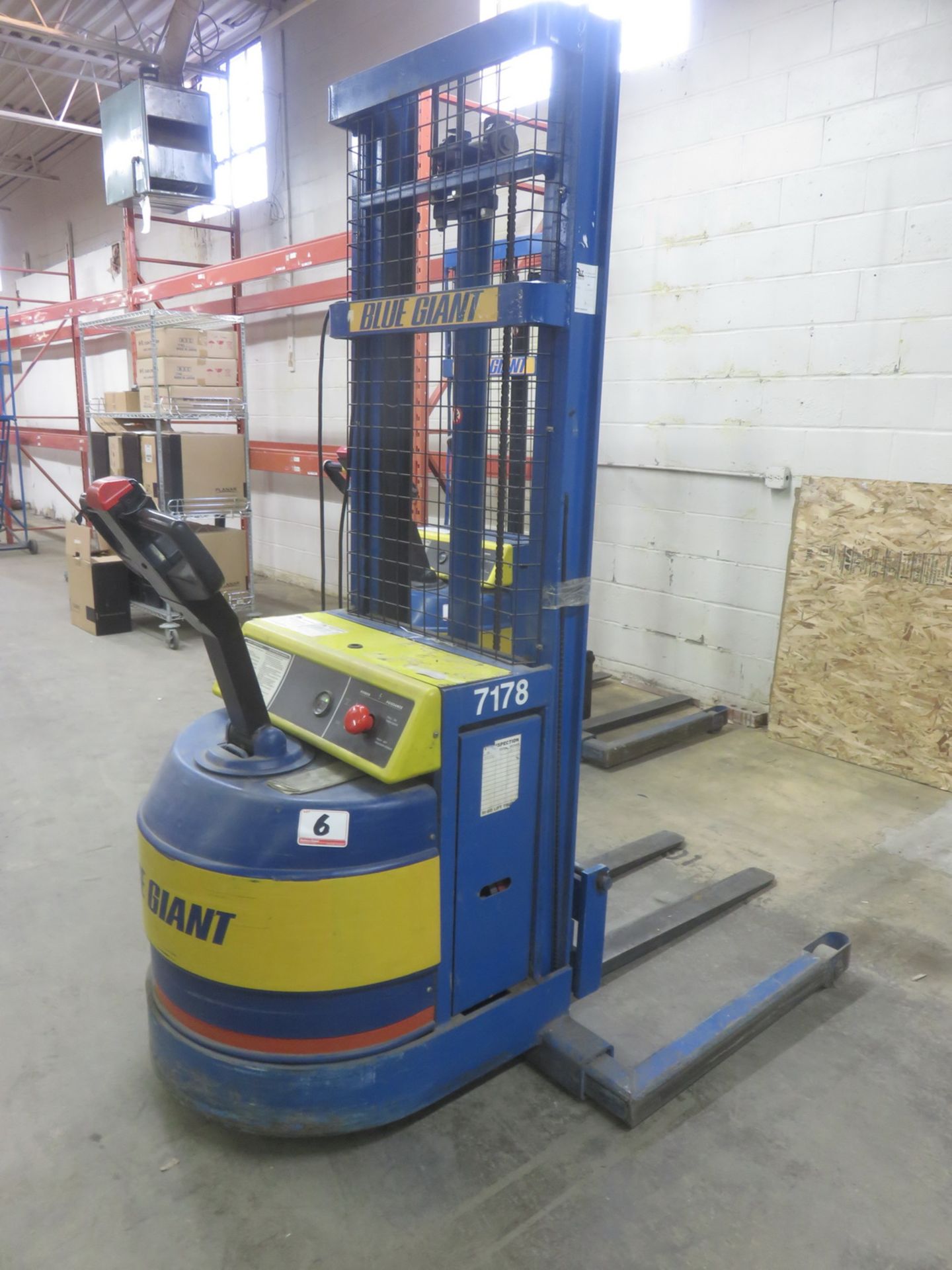 BLUE GIANT BGS30-130 3,000LBS CAP 130"H LIFT ELECTRIC PALLET STRADDLE STACKER W/ CHARGER, S/N