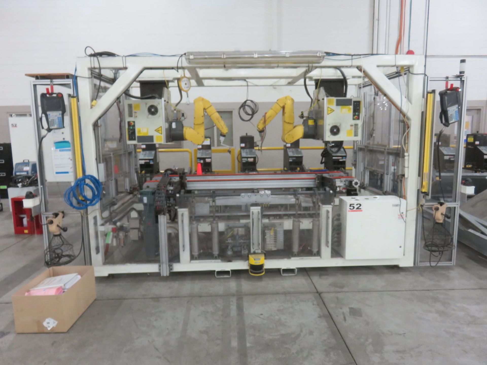 2010 KOOPS CUSTOM BUILT HIC STATIONS CONSISTING OF (2) 2010 FANUC LR MATE 200I C/SL 5-AXIS ROBOTS