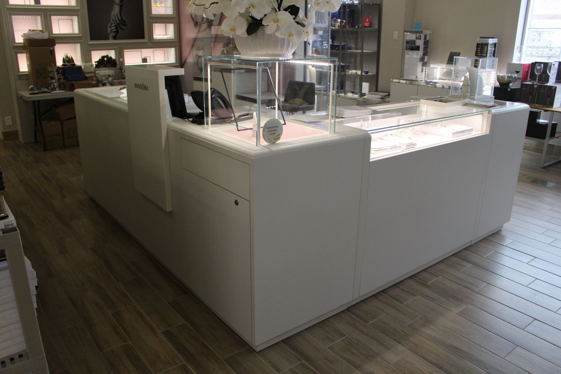 L-SHAPED WHITE LACQUER & GLASS JEWELRY DISPLAY SHOWCASE (LOCATED AT 3590 Rutherford Road, Woodbrid