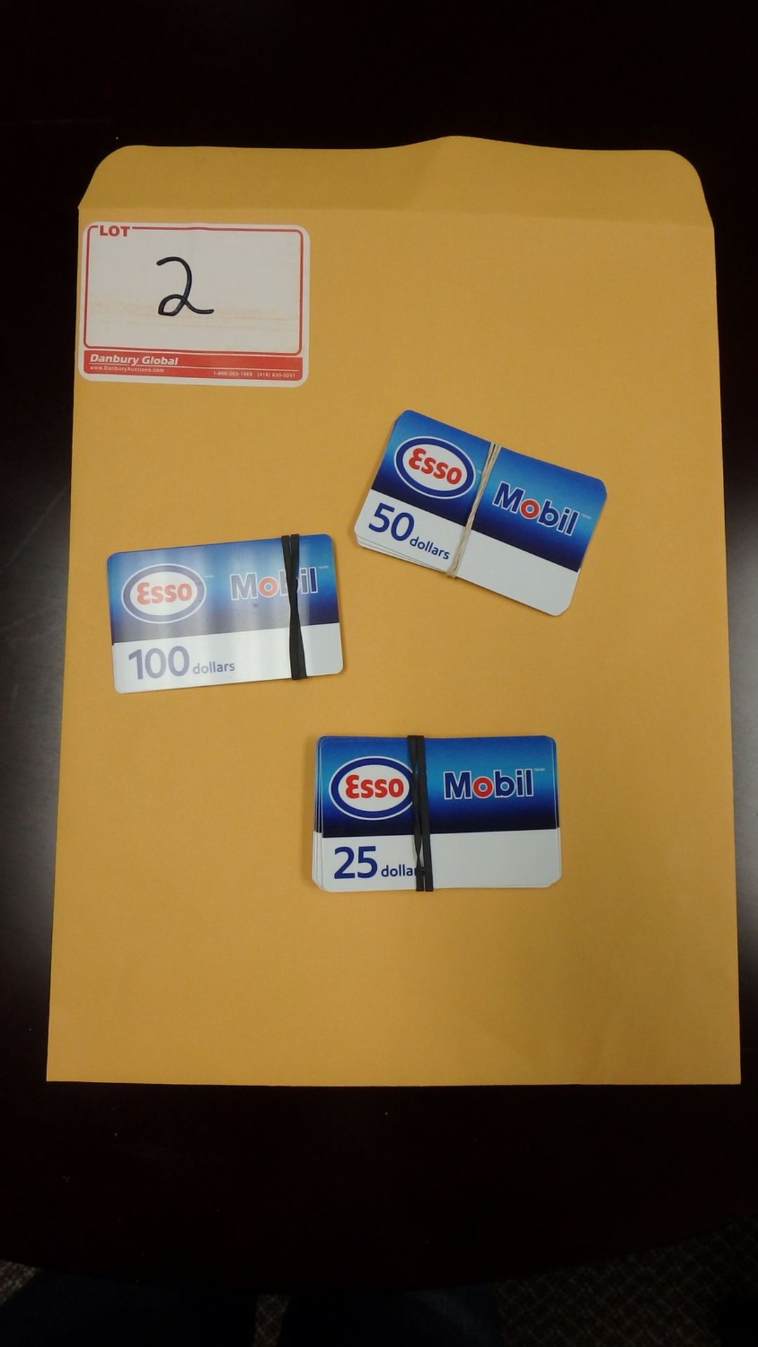 LOT - ESSO GIFT CARDS - TOTAL VALUE $600 (2 X $100 / 10 X $25 / 3 X $50)