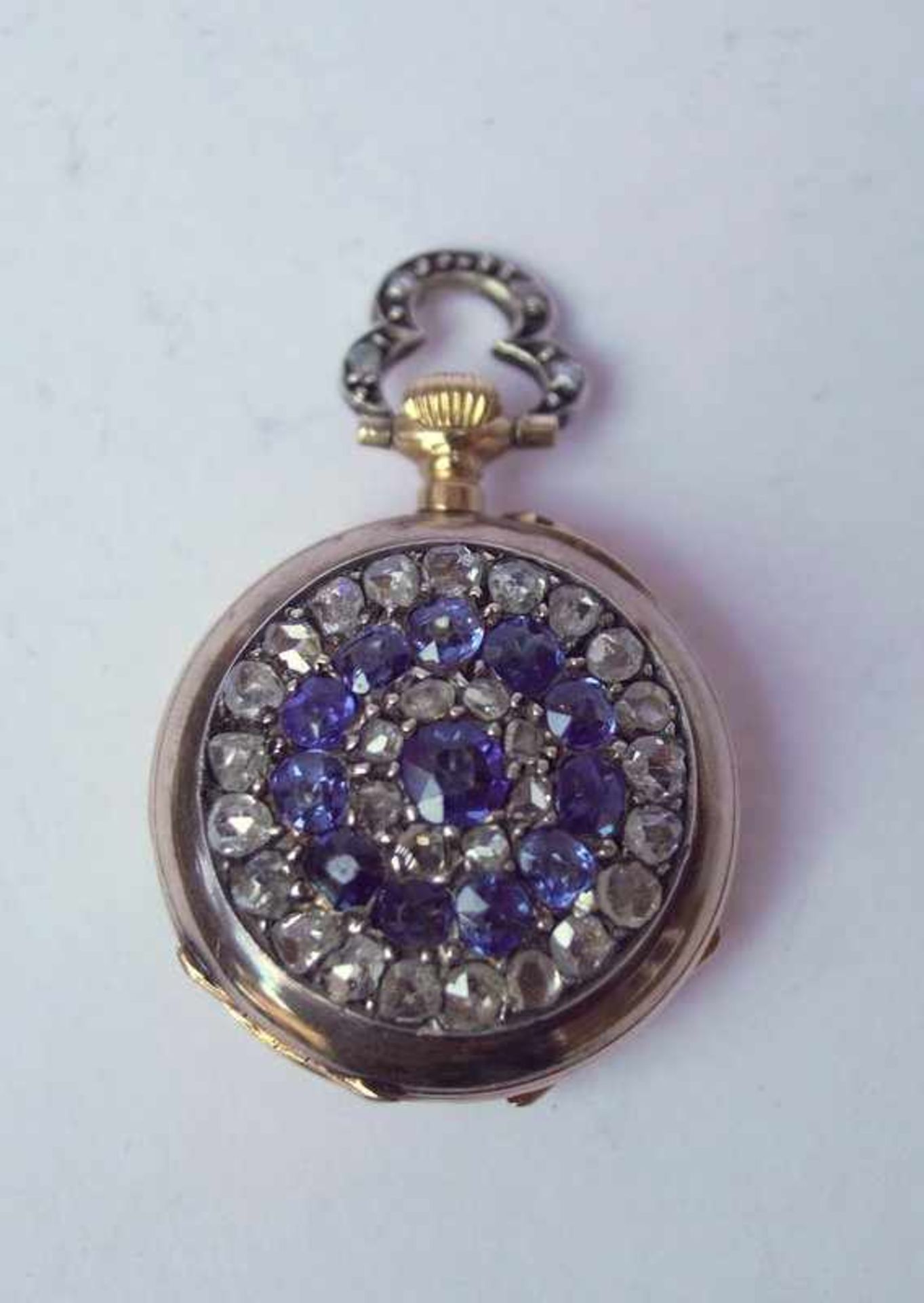 Kleine Damen-Taschenuhr, 585 RG mit Diamantspalt- und Saphirbesatz