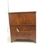 Early 19thC hardwood commode on bracket base, 2 false drawers with turned handles, 75 (ht) x 65 x 48