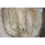 Man's lined long Mongolian fleece coat, made to withstand Arctic conditions; leather fastening,
