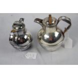 2 Deco silver plated Guernsey jugs