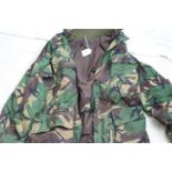 Camouflage/combat army gear: Goretex NATO tropical combat jacket and trousers, trousers size 85/92/