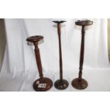 Three vintage turned wood ashtray stands. Currently in vogue as large candleholders or torchiere