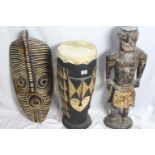 Native artefacts - tall wooden drum, wooden shield (shield has a crack) and heavy wooden carved