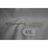 Victorian silver butter knife with engraved 'W' on handle, maker William Hutton, Sheffield