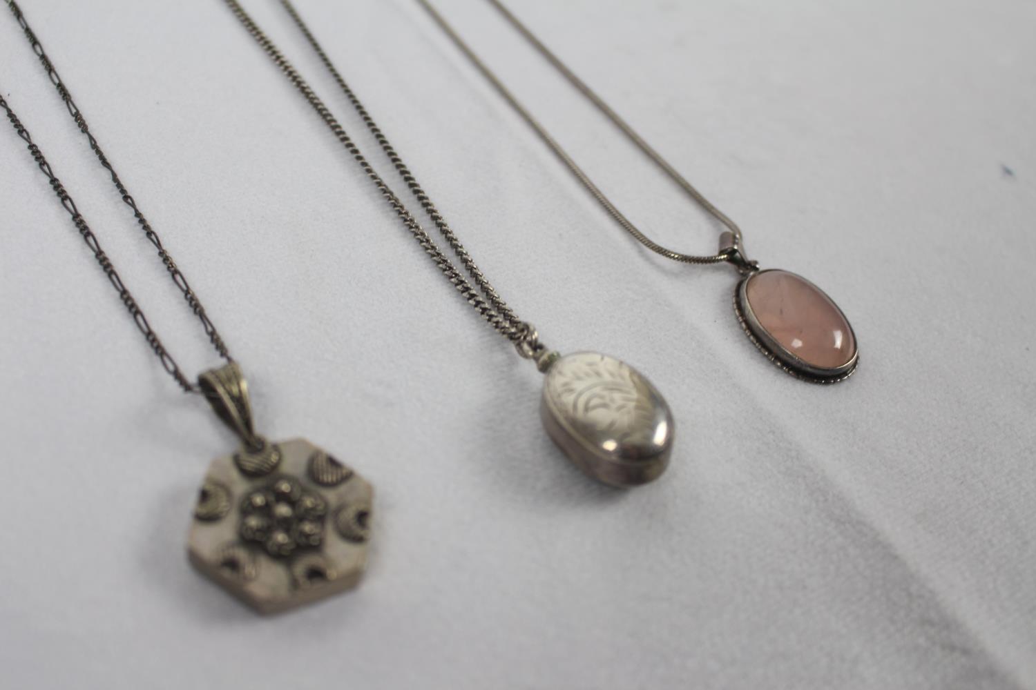 Three silver necklaces / pendants - Image 3 of 3