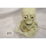 Cast iron spooky skeleton moneybox