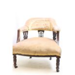 Very elegant Victorian tub chair upholstered in buff velvet, on castored legs.