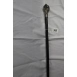 Walking stick with ball and claw top