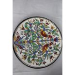 Large wall hanging pottery plate with bird and tree design