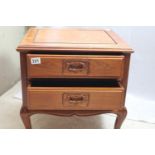 Small two-drawer chest of drawers, decorative carved handles and cabriole legs