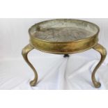 Circular three-legged brass wine cooler with drainage top